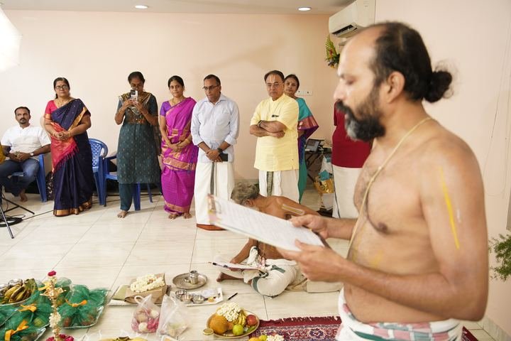 A priest reading out the engagement document